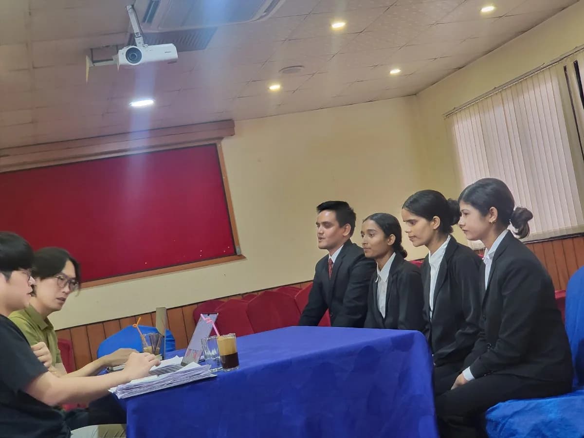 Candidates and interviewers taking part in an interview session